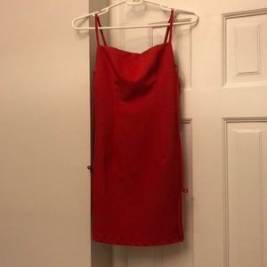 Strappy bright red body con dress